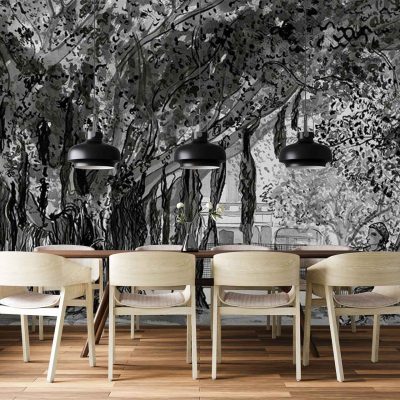 Large monochrome mural wallpaper featuring dense, leafy trees in shades of grey, black, and white. The design includes intricate tree branches and leaves, creating a forest-like scene with rich details and high contrast.