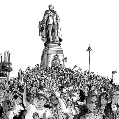 Wallpaper features: vibrant crowd scene, busy, numerous people, protest signs in bright colors (red, blue, yellow), hands raised throughout. Background includes a tall statue of a man in a cape on a stone pedestal against the sky. Dominant colors: warm skin tones, dark clothing accents, neutral grays of statue and pedestal. Energetic and dynamic atmosphere.