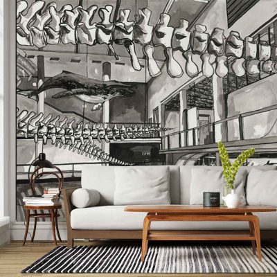 Large-scale black-and-white wallpaper mural depicting a museum interior with dramatic arches, soaring ceilings, and prominent dinosaur skeletons, including long, curving bones and skulls. High-contrast grayscale tones dominate, with intricate architectural details and fossil forms emphasized.