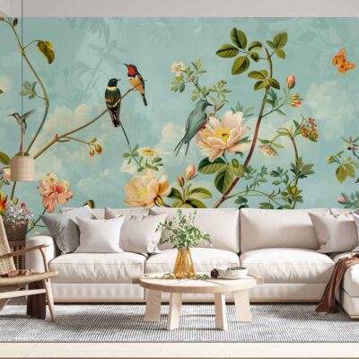 Large floral wallpaper featuring vibrant flowers in reds, pinks, yellows, and greens; delicate birds perched among the blooms; colorful butterflies fluttering throughout; all set against a rich blue background.