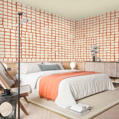 Grid-patterned orange and white wallpaper featuring a repeating, geometric grid of bold orange lines on a crisp white background. The design is modern and bright, with sharp right angles and clean edges; the orange squares or rectangles form a uniform check pattern that stands out against the neutral white. This contemporary wallpaper showcases vibrant orange intersecting lines creating an orderly lattice effect for a striking accent wall in any room.